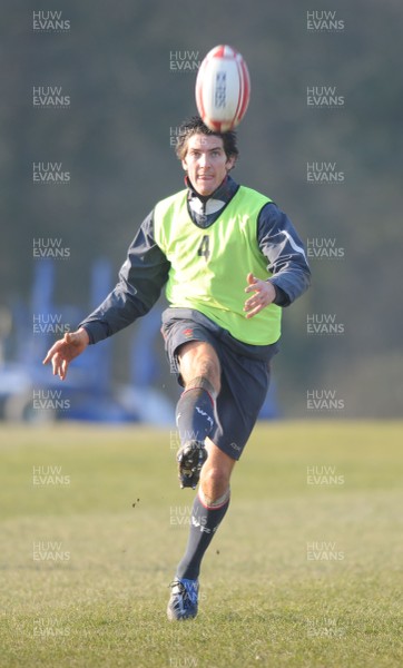18.02.08 - Wales Rugby Training - James Hook kicks ahead during training 