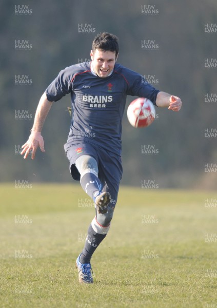 18.02.08 - Wales Rugby Training - Stephen Jones kicks ahead during training 