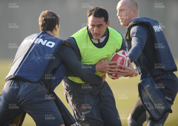 18.02.08 - Wales Rugby Training - Sonny Parker is tackled by Mark Jones(L) during training 
