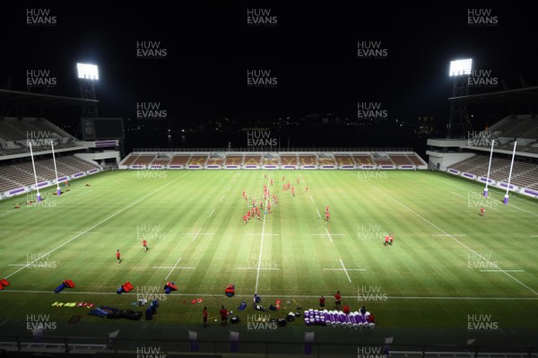 180919 - Wales Rugby Training - Players warm up under floodlights during training