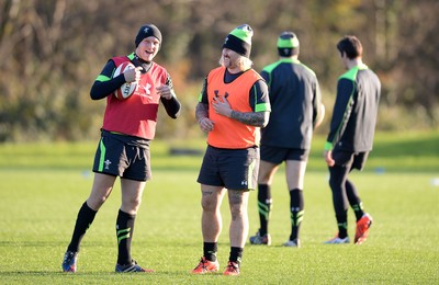 181114 - Wales Rugby Training - Dan Biggar and Richard Hibbard laugh during training