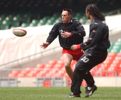 190203 - Wales Rugby Training - Recalled centre Mark Taylor moves the ball during training