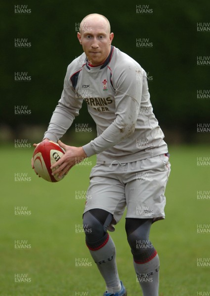 190207 - Wales Rugby Training - Tom Shanklin looks for support during training 