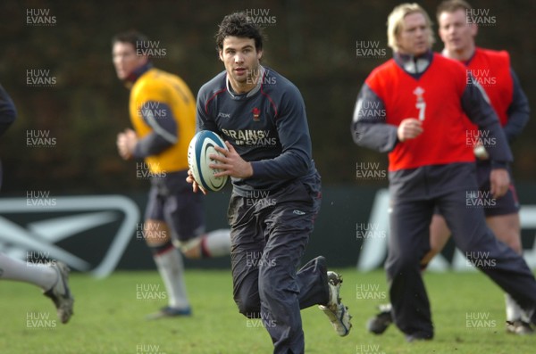 200207 - Wales Rugby Training - Mike Phillips looks for support during training 