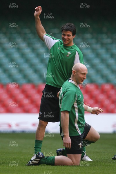 20.03.09 - Wales Rugby Wales' Mike Phillips (standing) and Tom Shanklin takes part in a training session ahead of his sides Six Nations decider against Ireland tomorrow (Sat) 