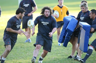 20.05.07  Wales rugby on Tour to Australia Adam Jones passes to Mike Phillips during training in Terrigal. 