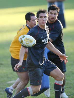 20.05.07  Wales rugby on Tour to Australia James Hook watched by Mike Phillips and Gareth Cooper during  training in Terrigal. 