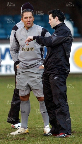 210206 - Wales Rugby Training Wales' Gavin Henson chats to Stephen Jones during a training session at Cardiff Arms Park, ahead of his sides clash against Ireland  