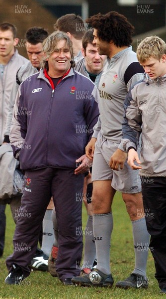 210206 - Wales Rugby Training Wales caretaker coach Scott Johnson shares a joke with Colin Charvis during a training session at Cardiff Arms Park, ahead of his sides clash against Ireland  