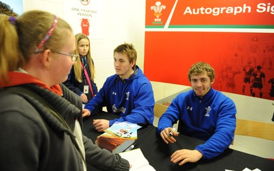 21.02.11 - Wales Rugby Training - Jonathan Davies and Leigh Halfpenny sign autographs at a Wales rugby training session which was opened up to the public at the Millennium Stadium. 