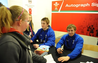 21.02.11 - Wales Rugby Training - Jonathan Davies and Leigh Halfpenny sign autographs at a Wales rugby training session which was opened up to the public at the Millennium Stadium. 