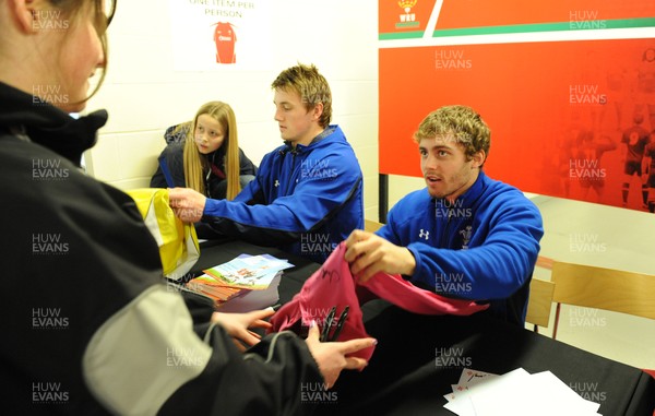 21.02.11 - Wales Rugby Training - Jonathan Davies and Leigh Halfpenny sign autographs at a Wales rugby training session which was opened up to the public at the Millennium Stadium. 