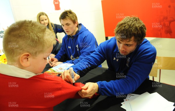 21.02.11 - Wales Rugby Training - Jonathan Davies and Leigh Halfpenny sign autographs at a Wales rugby training session which was opened up to the public at the Millennium Stadium. 