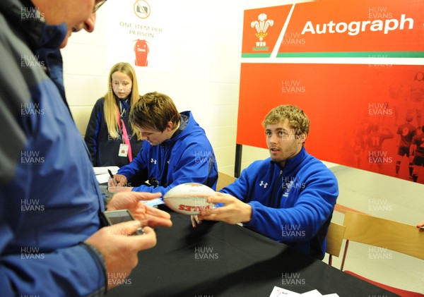 21.02.11 - Wales Rugby Training - Jonathan Davies and Leigh Halfpenny sign autographs at a Wales rugby training session which was opened up to the public at the Millennium Stadium. 