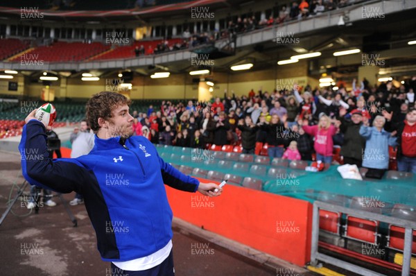 21.02.11 - Wales Rugby Training - Leigh Halfpenny throws signed rugby balls into the crowd at a Wales rugby training session which was opened up to the public at the Millennium Stadium. 