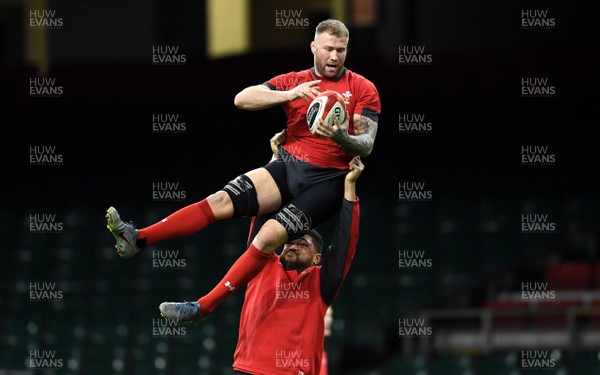 210220 - Wales Rugby Training - Ross Moriarty is lifted by Taulupe Faletau during training