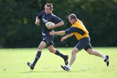 21.05.07  Wales rugby on Tour to Australia Scott Morgan gets past Iestyn Thomas during training in Terrigal. 