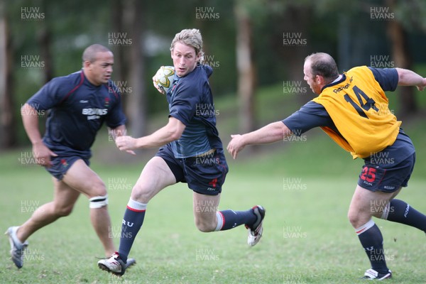 21.05.07  Wales rugby on Tour to Australia Jamie Robinson gets past Ceri Jones during training in Terrigal. 