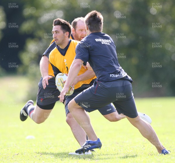 21.05.07  Wales rugby on Tour to Australia Gavin Henson is enveloped by Ceri Jones and Chris Czekaj during training in Terrigal. 
