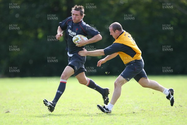 21.05.07  Wales rugby on Tour to Australia Scott Morgan gets past Iestyn Thomas during training in Terrigal. 
