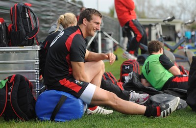 21.09.11 - Wales Rugby Training - Sam Warburton looks on during training. 