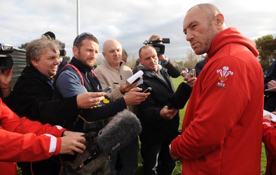 21.09.11 - Wales Rugby Training - Forwards coach Robin McBryde talks to reporters during training. 