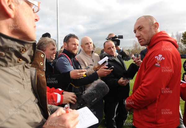 21.09.11 - Wales Rugby Training - Forwards coach Robin McBryde talks to reporters during training. 