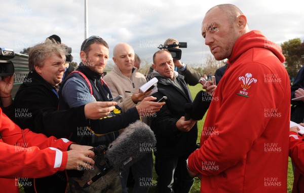 21.09.11 - Wales Rugby Training - Forwards coach Robin McBryde talks to reporters during training. 