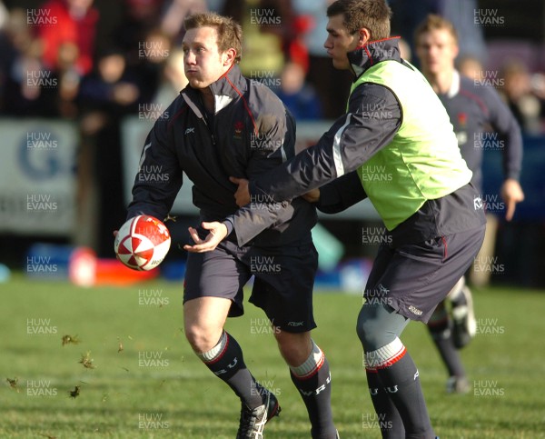 21.11.07 - Wales Rugby Training - Morgan Stoddart is tackled by Tom James during training 