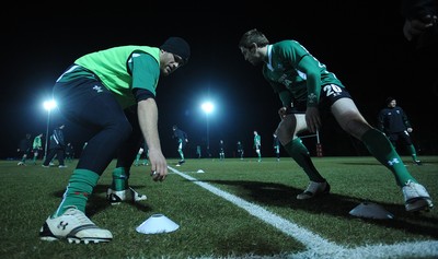 22.02.10 - Wales Rugby Training - Jamie Roberts and Andrew Bishop take part in a night training session in preparation for their teams Friday night match with France. 