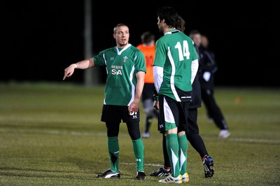 22.02.10 - Wales Rugby Training - Richie Rees(L) and Mike Phillips during a night training session in preparation for Wales Friday night match with France. 