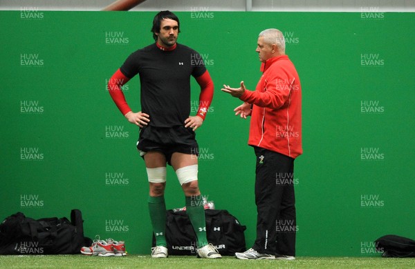 22.02.10 - Wales Rugby Training - Jonathan Thomas talks to wales head coach Warren Gatland during training. 