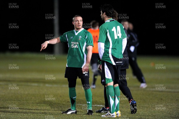 22.02.10 - Wales Rugby Training - Richie Rees(L) and Mike Phillips during a night training session in preparation for Wales Friday night match with France. 