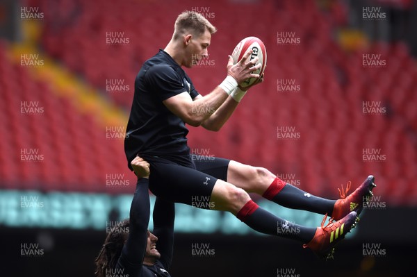 220219 - Wales Rugby Training - Liam Williams is lifted by Josh Navidi during training