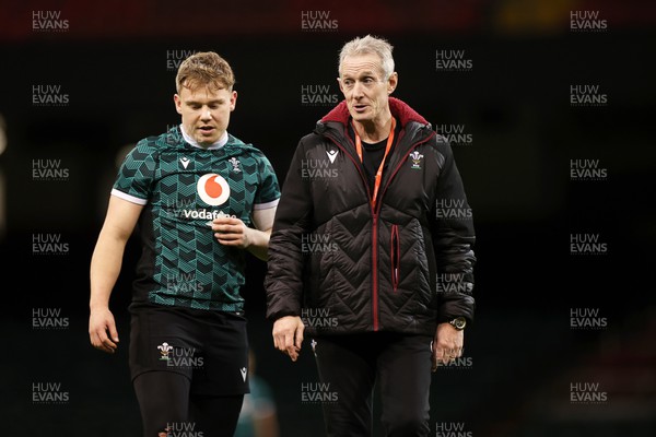 220224 - Wales Rugby Training in the Principality Stadium leading up to their 6 Nations game against Ireland - Sam Costelow and Rob Howley during training