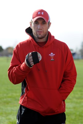 22.06.10 - Wales Rugby Training - Andrew Bishop show off his hand brace during training. 