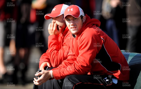 22.06.10 - Wales Rugby Training - Jamie Roberts and Andrew Bishop look on during training. 