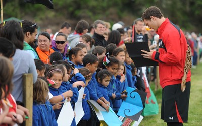 22.09.11 - Wales Rugby Training - George North signs autographs during training. 