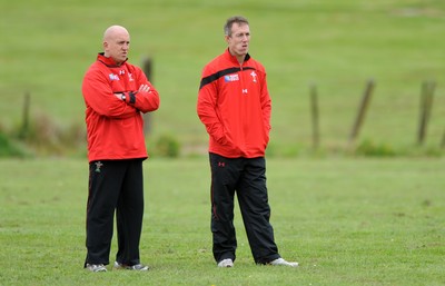 22.09.11 - Wales Rugby Training - Defence coach Shaun Edwards and attack coach Rob Howley during training. 