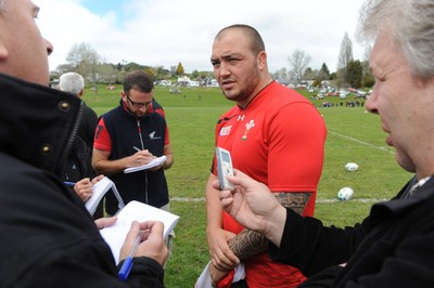 22.09.11 - Wales Rugby Training - Craig Mitchell talks to reporters during training. 