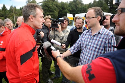 22.09.11 - Wales Rugby Training - Attack coach Rob Howley talks to reporters during training. 