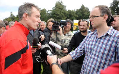 22.09.11 - Wales Rugby Training - Attack coach Rob Howley talks to reporters during training. 