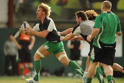 23.02.09 - Wales Rugby Training - Andy Powell is tackled by Huw Bennett and Adam Jones during training. 