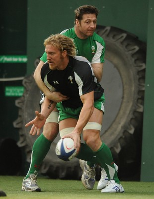 23.02.09 - Wales Rugby Training - Andy Powell is tackled by Ian Gough during training. 