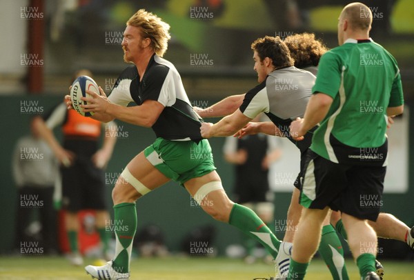 23.02.09 - Wales Rugby Training - Andy Powell is tackled by Huw Bennett and Adam Jones during training. 