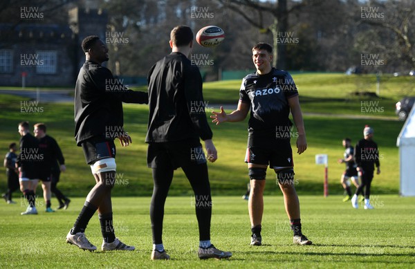 230223 - Wales Rugby Training - Christ Tshiunza, Mason Grady and Dafydd Jenkins during training