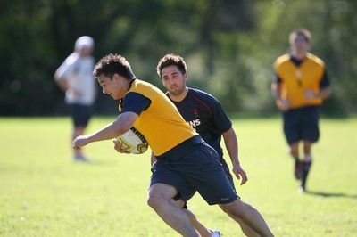 23.05.07  Wales rugby on Tour to Australia Chris Czekaj goes around Gavin Henson during training  in Terrigal. 