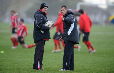 23.06.10 - Wales Rugby Training - Kicking coach Neil Jenkins and Backs coach Rob Howley during training. 