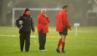 23.06.10 - Wales Rugby Training - Kicking coach Neil Jenkins, Head coach Warren Gatland and Ryan Jones look on during training. 