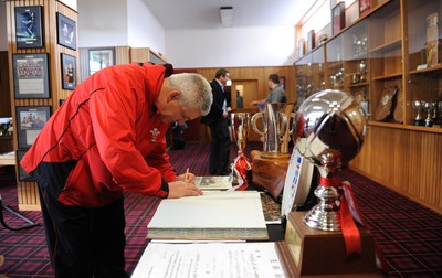 23.06.10 - Wales Rugby Training - Wales Head coach Warren Gatland signs the guest book at Hamilton Boys High School after an assembly and training at his former school. 